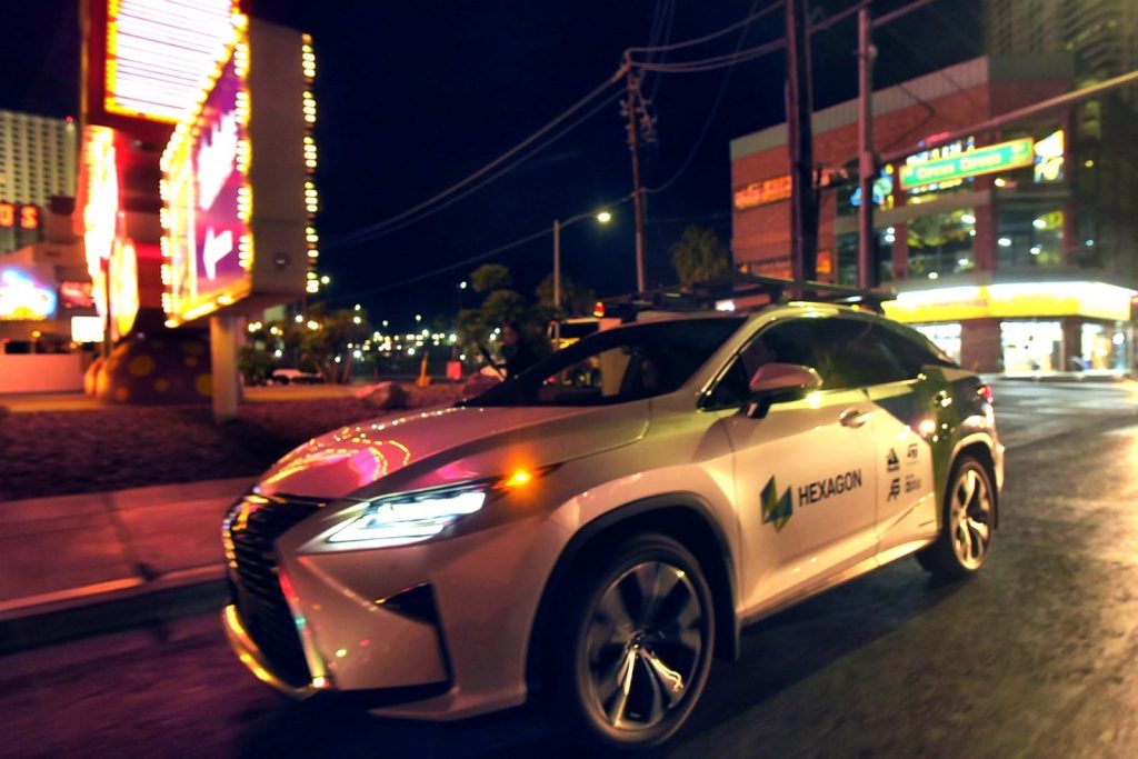 Hexagon branded vehicle on a Las Vegas street at night